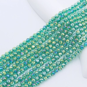 Close-up of 4mm faceted mint green crystal beads with sparkling AB rainbow coating