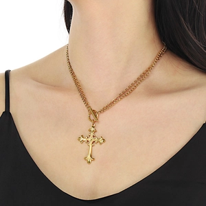 Detailed view of a gold cross pendant necklace on neck featuring a secure OT toggle clasp