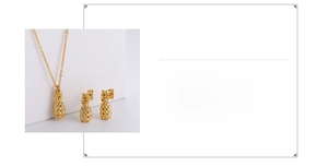 Detail of 18K gold plated pineapple jewelry set featuring necklace and earrings