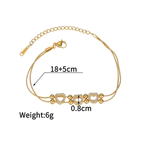 Detail of gold stainless steel heart bracelet with rhinestones and 18+5cm size specs