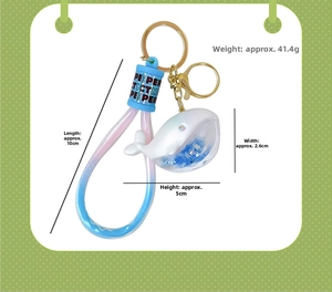 Detailed dimensions of cartoon whale keychain with blue quicksand and star sequins