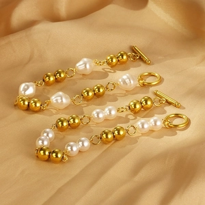 18k gold plated stainless steel bead bracelet with pearls and OT toggle clasp on silk