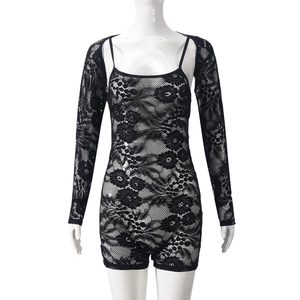 Detail of floral lace texture and hollow design on a black two-piece long sleeve bodysuit