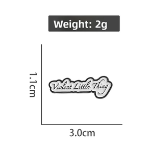 Detail view of the metal enamel pin showing precise 3.0cm x 1.1cm dimensions and 2g weight