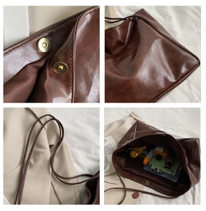 Detail view of brown PU leather tote bag showing magnetic closure and interior storage