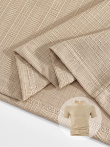 Macro shot of khaki waffle textured fabric with V-neck detail and pocket for men