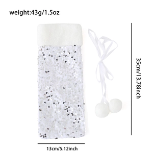 Close-up of white sequined wine bottle cover with faux fur trim and dimensions 13x35cm