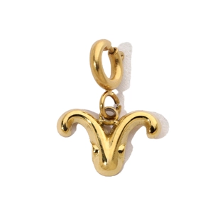 Macro view of gold stainless steel Aries zodiac pendant with spring ring clasp