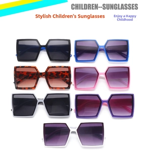 Flat lay of colorful children's oversized square sunglasses in seven stylish colorways