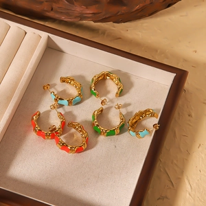Bamboo-style C-shaped stainless steel earrings in green, blue, and orange with gold accents