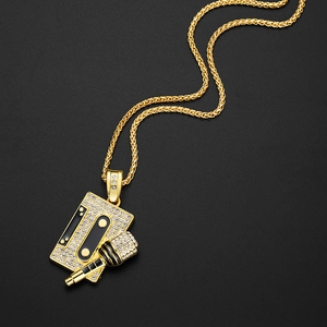Hip hop gold necklace with iced out cassette tape and microphone pendant on twisted chain