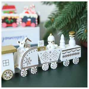 Detail of wooden Christmas train decor with snowmen and bears in white and gold