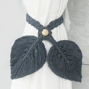 Handmade dark grey macrame curtain tieback with leaf shape and wooden bead detail