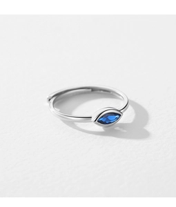 Detail of adjustable S925 sterling silver ring with blue marquise-cut evil eye stone