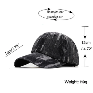 Distressed washed denim baseball cap with torn details and adjustable strap sizing