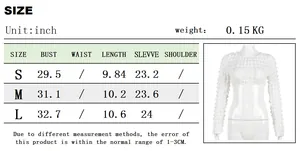 Detailed size chart for the hollow bubble long sleeve crop top in inches and centimeters