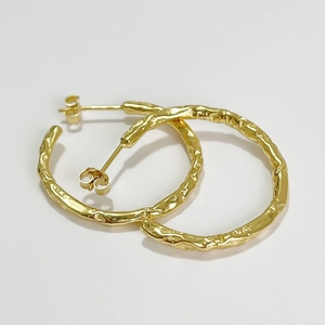 Textured gold-plated sterling silver hoop earrings with a molten lava finish for women