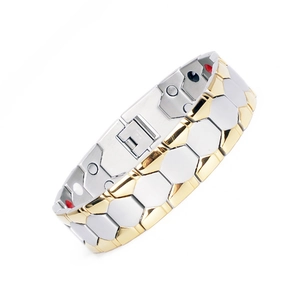 Men's titanium steel magnetic therapy bracelet with gold accents and folding clasp