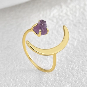 Minimalist gold moon open ring featuring a claw-set purple raw amethyst stone
