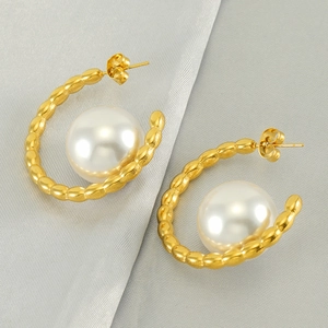 Elegant gold C-shaped pearl earrings with wave texture and polished finish for women