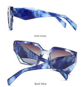 Detail view showing blue marble texture frames and gradient lenses of oversized sunglasses