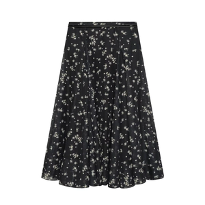 Elegante gonna midi floreale nera con motivi bianchi e cintura coordinata in vita