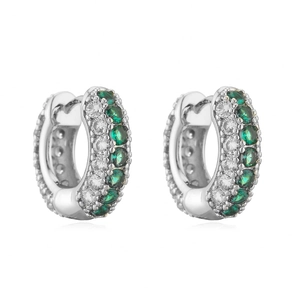 Detail view of silver hoop earrings paved with green and clear zircon stones