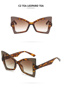 Detail of tea leopard cat eye sunglasses with tortoise frame and brown gradient lenses