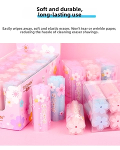Close-up of pink and blue cherry blossom shaped creative erasers in aesthetic gift packaging