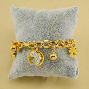Bracelet en acier inoxydable doré avec breloque carte du monde et strass brillants