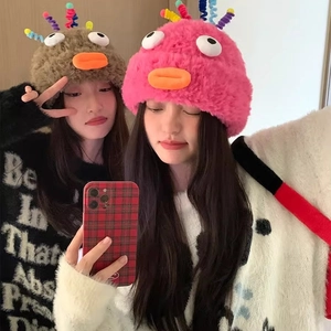 Funny plush monster beanies with large eyes and ears in pink and coffee brown colors