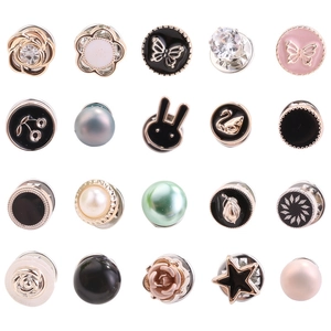 Mini pearl brooch pins in various designs like flowers and stars for clothing decoration