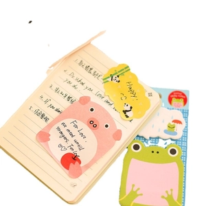 Cute cartoon animal sticky notes featuring pink pig, green frog and panda on a notebook