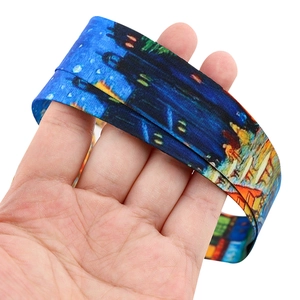 Detail shot of a polyester lanyard featuring Van Gogh's Starry Night oil painting print