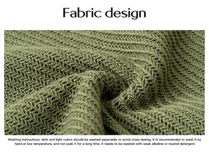 Gros plan sur un tissu en maille verte avec des détails de tissage croisé complexe en V