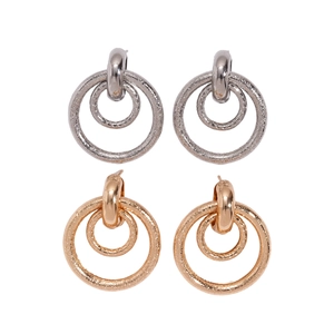 Matte geometric hollow round stud earrings in gold and silver finish on white background