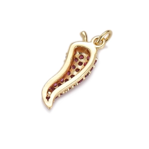 Detail of 18K gold cornicello pendant with fuchsia zircon inlay and top hanging ring