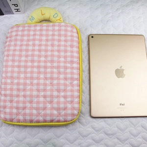 Pink gingham quilted laptop sleeve with yellow handles and Melody embroidery