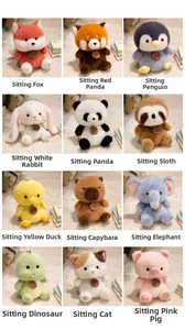 Collection of twelve assorted plush animals in sitting poses on a soft beige carpet