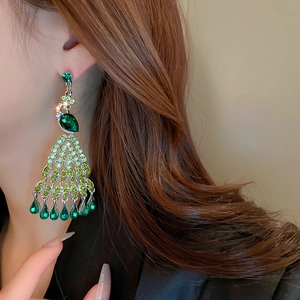 Elegant vintage peacock earrings with green crystals and drop tassel for women's gala