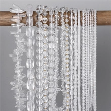 Detailed display of transparent clear quartz beads in various shapes for jewelry making