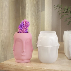 Detail van witte siliconen mal voor 3D-gezicht bloempot en DIY kaarsenhouder maken