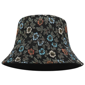 Retro floral reversible bucket hat featuring colorful ethnic jacquard knitting on black fabric