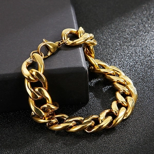 Polished chunky gold Cuban link chain bracelet for men with classic lobster clasp detail