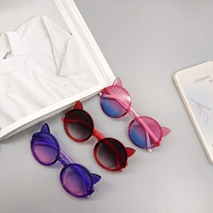 Kids cute cat ear sunglasses with UV protection in purple and red sparkling colors