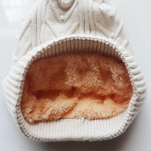 Winter knitted beanie with pearl decor and thick thermal faux shearling lining