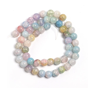 Macro detail of mixed pastel crackle glass beads for DIY jewelry and crafts making