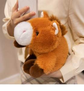 Close-up of soft brown capybara plush toy with realistic fur texture and round muzzle
