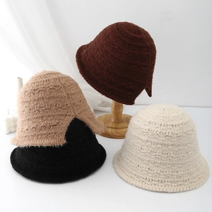 Winter knitted bucket hat for women available in brown black and beige thick warm style