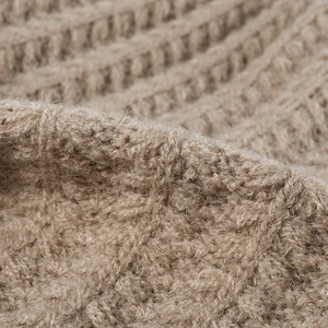 Chunky knit camel beanie for women with warm thick wool texture and cable stitch detail